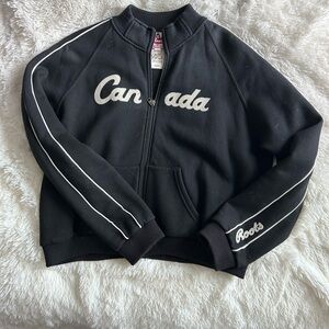 Roots Black Jacket with White and Burgundy Canada Crest